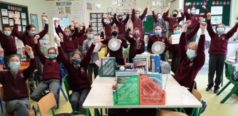 Image: Pupils from Scoil Naomh Mhuire, Cork celebrating their FÍS Awards following an online ceremony.