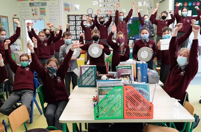 Image: Pupils from Scoil Naomh Mhuire, Cork celebrating their FÍS Awards following an online ceremony.