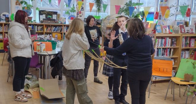 Students from Marino College working on parade props