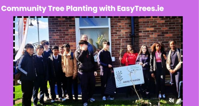 A group of students from Marino College stand around an Easy Tressie sign and potted trees