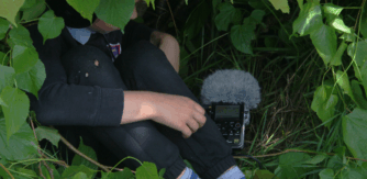 A student records tree sounds for Little Woodland Heights, Scoil Mhuire Eimhin