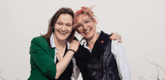 2 people smile - Call for Mother Tongues Board Members