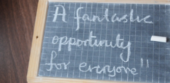 Kids Own artist panel call out. Blackboard with 'A fantastic opportunity for everyone' written in chalk.