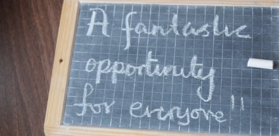 Kids Own artist panel call out. Blackboard with 'A fantastic opportunity for everyone' written in chalk.
