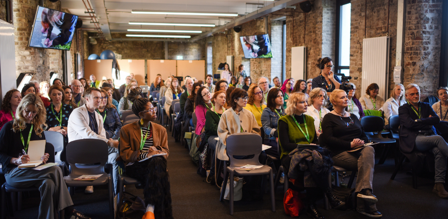 People sitting in a conference room - Kids' Own are hiring for a Portal Project Manager